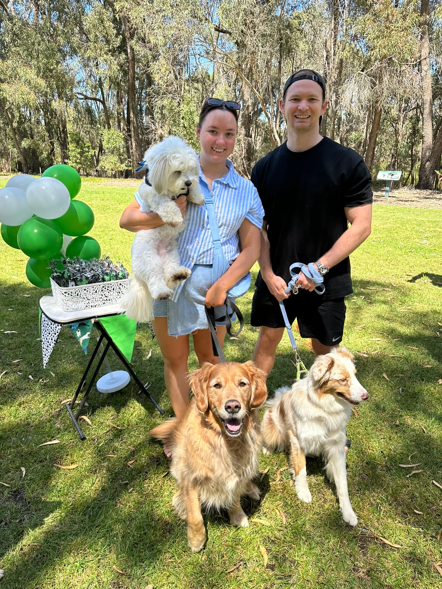 The Toby's Dog Grooming team celebrating one year in business